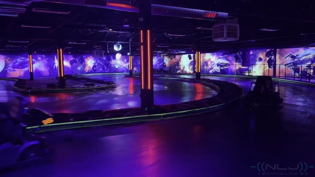 Go-karts passing synchronized LED columns